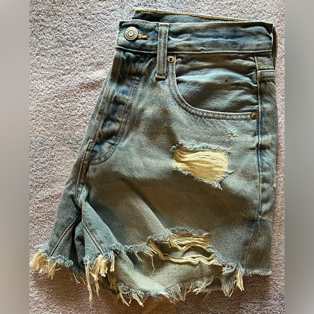 Slightly ripped Jean shorts